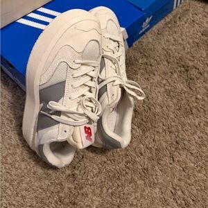 New Balance Kids Sneakers in White and Gray with Red Accent